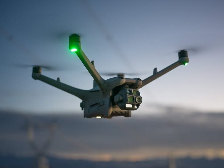 white and red drone